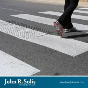 A pedestrian using a crosswalk in Laredo, TX